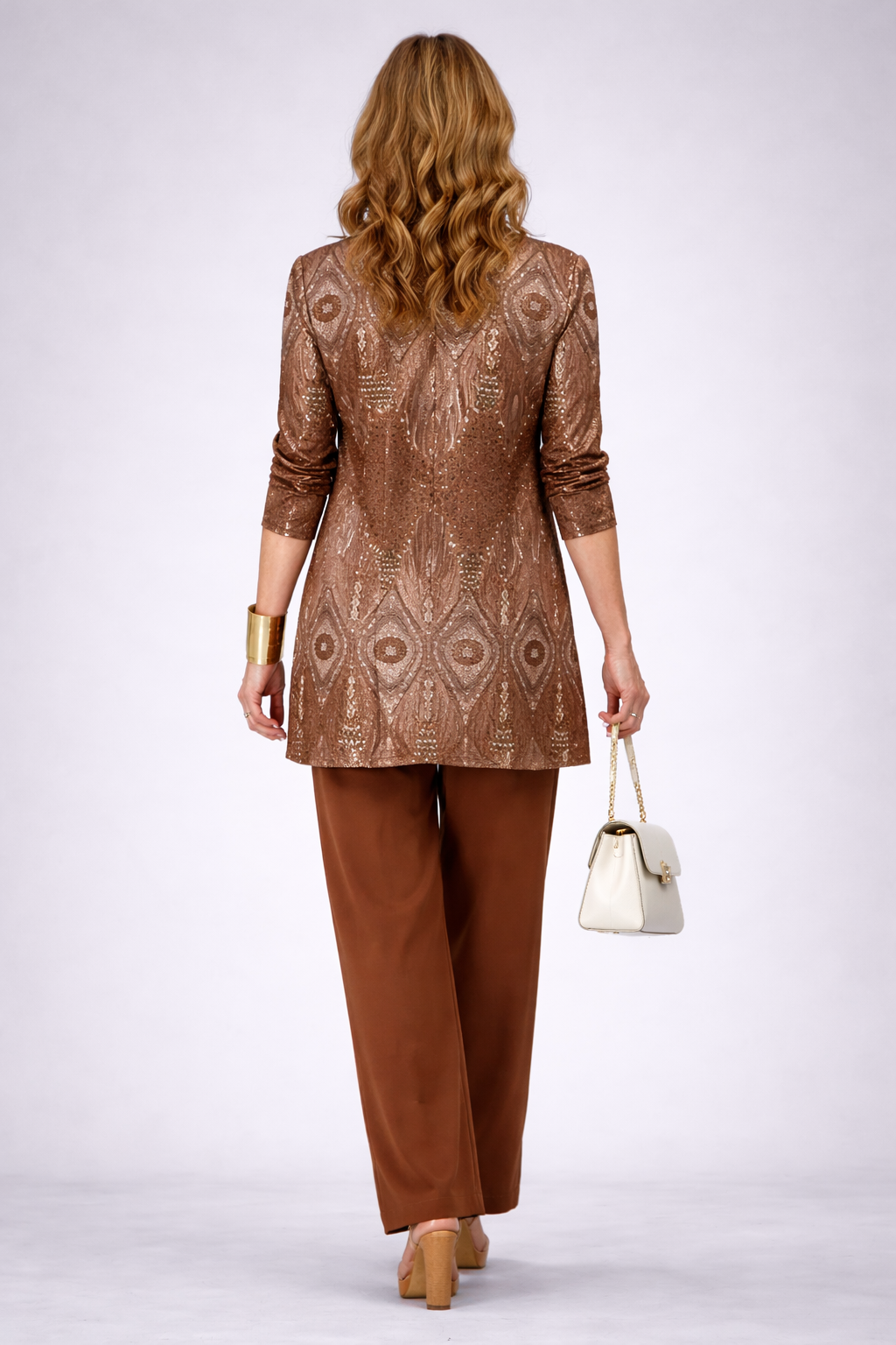 Back view of the cinnamon paisley print cardigan and pant set