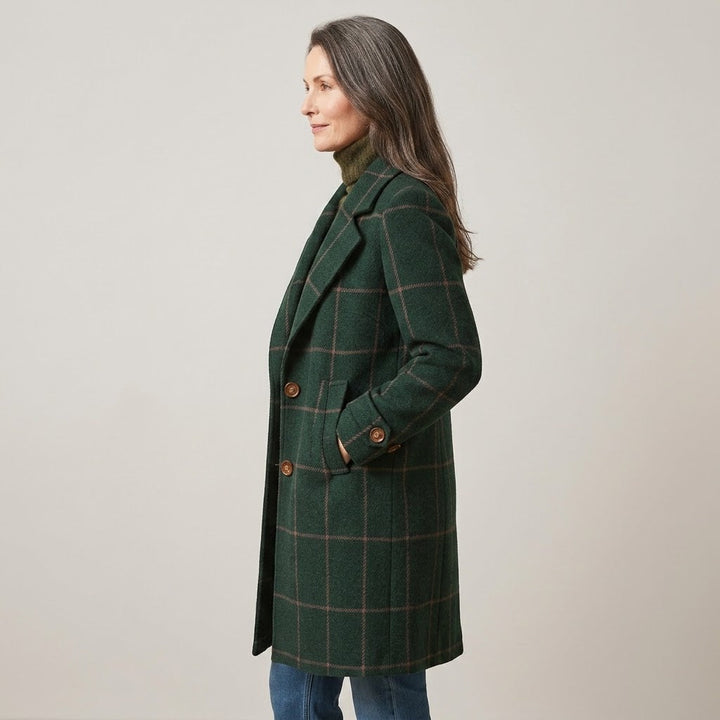 Side view of the green check coat with pockets