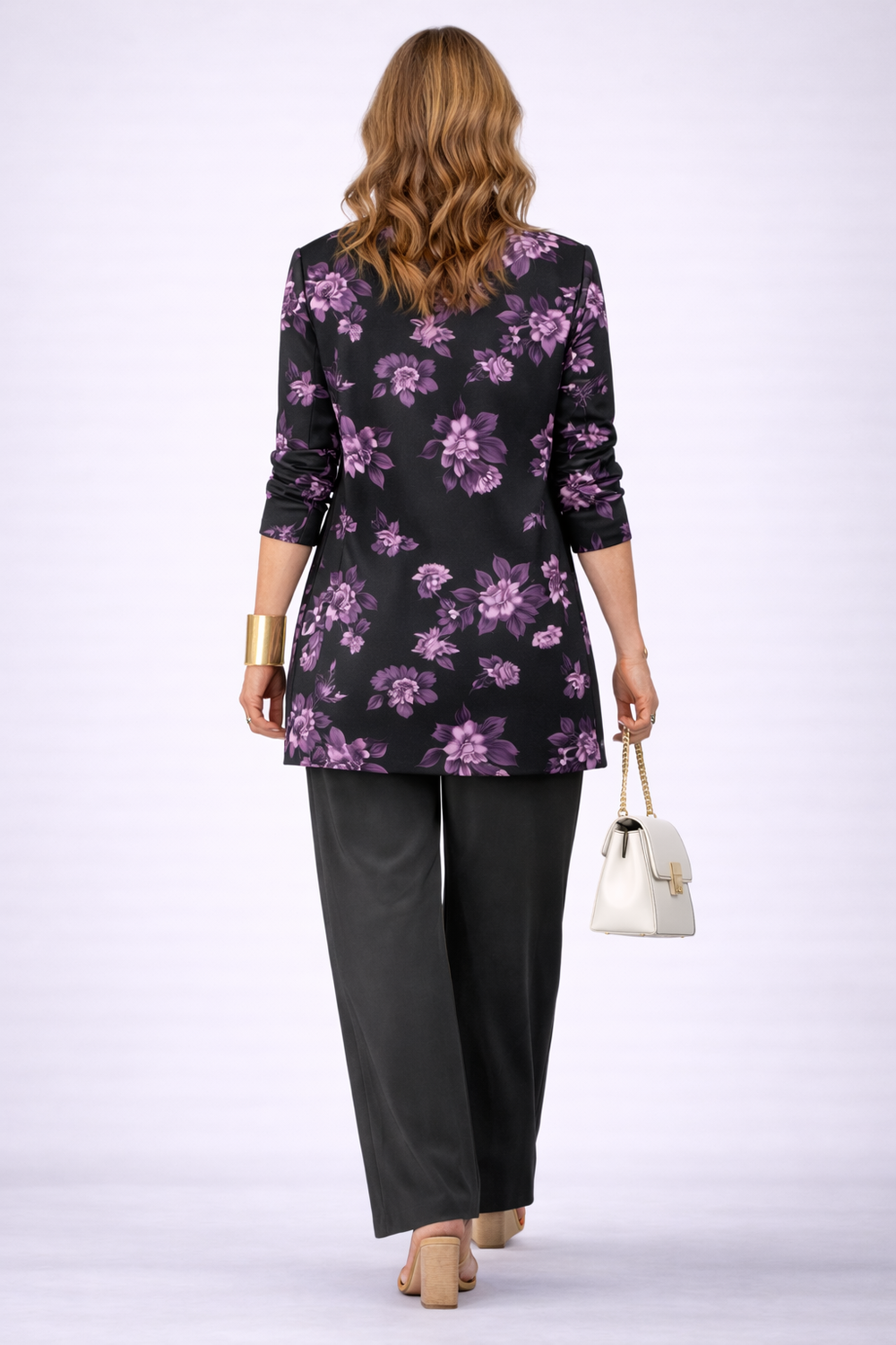 Back view of the black and purple floral print cardigan and pant set
