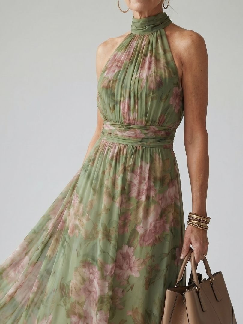 Close-up of the gathered halter neckline and defined waist