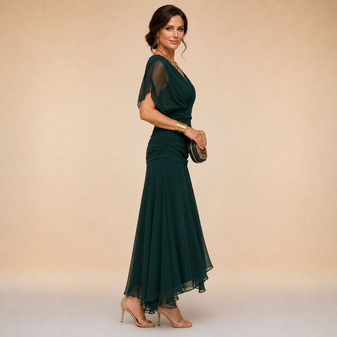 Side view of the forest green draped maxi dress