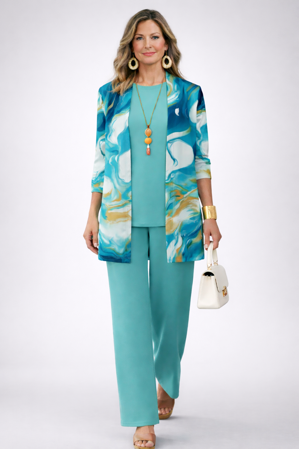 Another view of the turquoise marble print cardigan and pant set