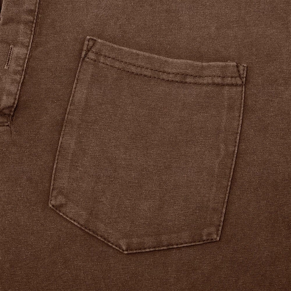 Close-up of brown henley chest pocket