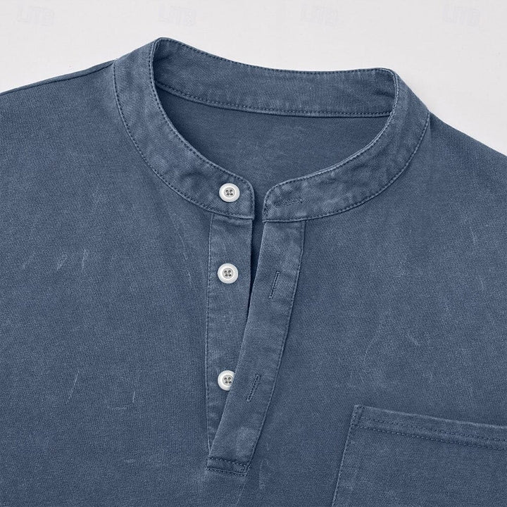 Close-up of denim blue henley band collar
