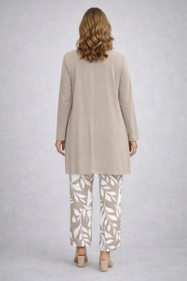 Back view of the taupe and white open-front cardigan and leaf print pant set