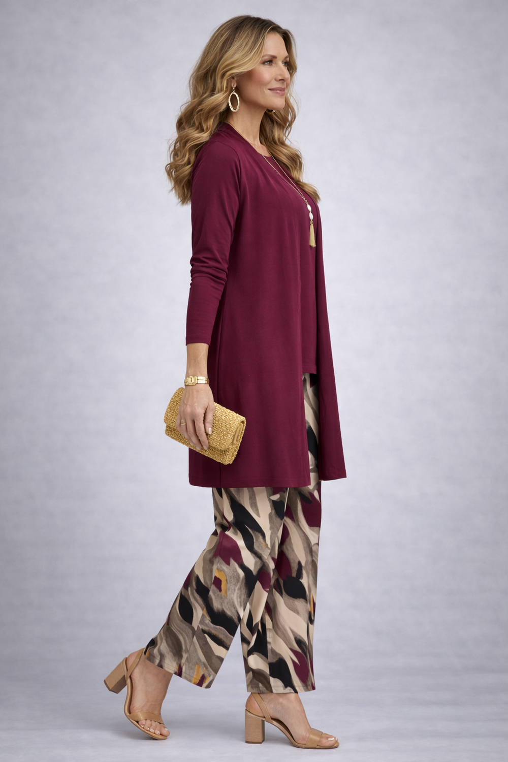 Another view of the burgundy open-front cardigan and abstract print pant set