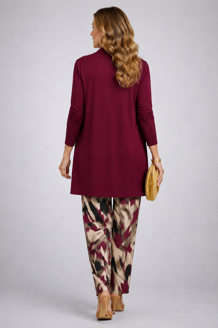 Another view of the burgundy open-front cardigan and abstract print pant set