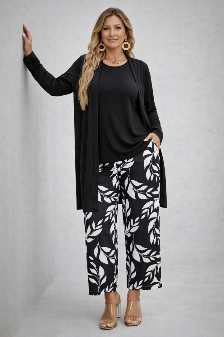 Women's black and white open-front cardigan and leaf print pant set