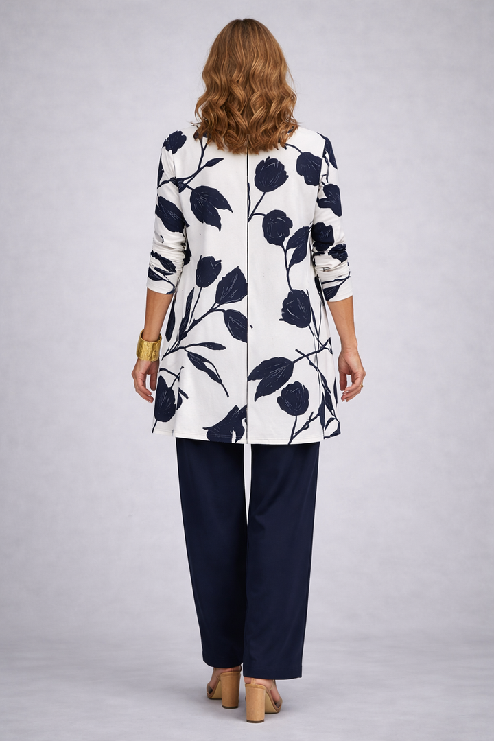 Back view of the navy and white leaf print cardigan and pant set
