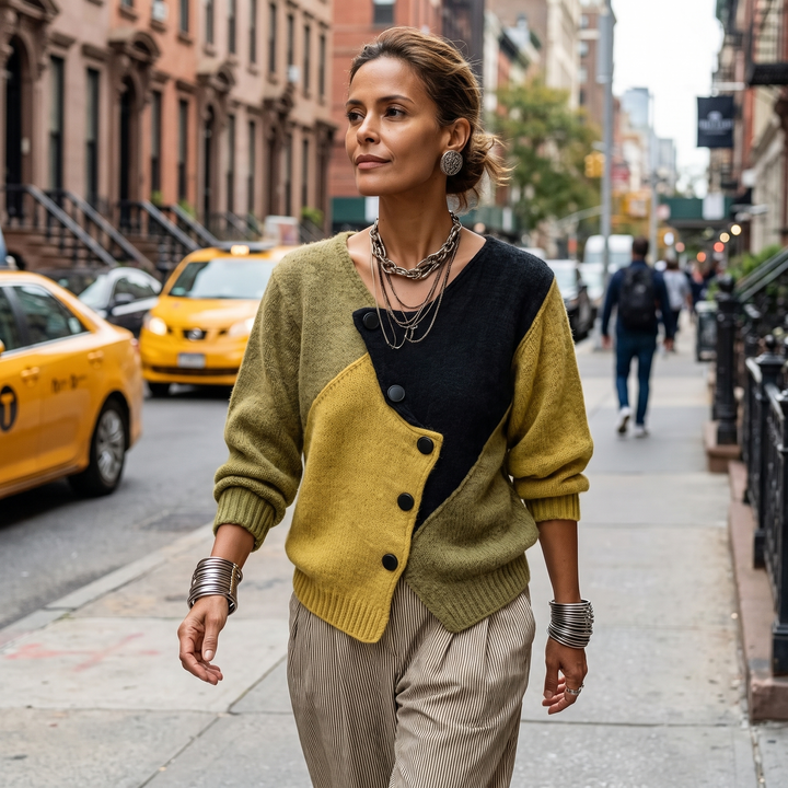 Woman wearing a color-block cardigan on a city street