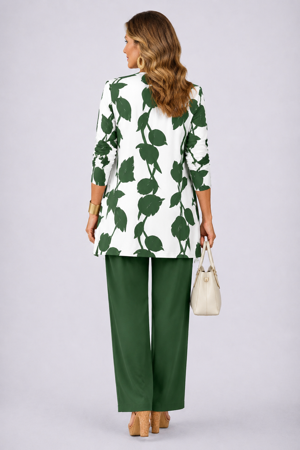 Back view of the forest green and white leaf print cardigan and pant set