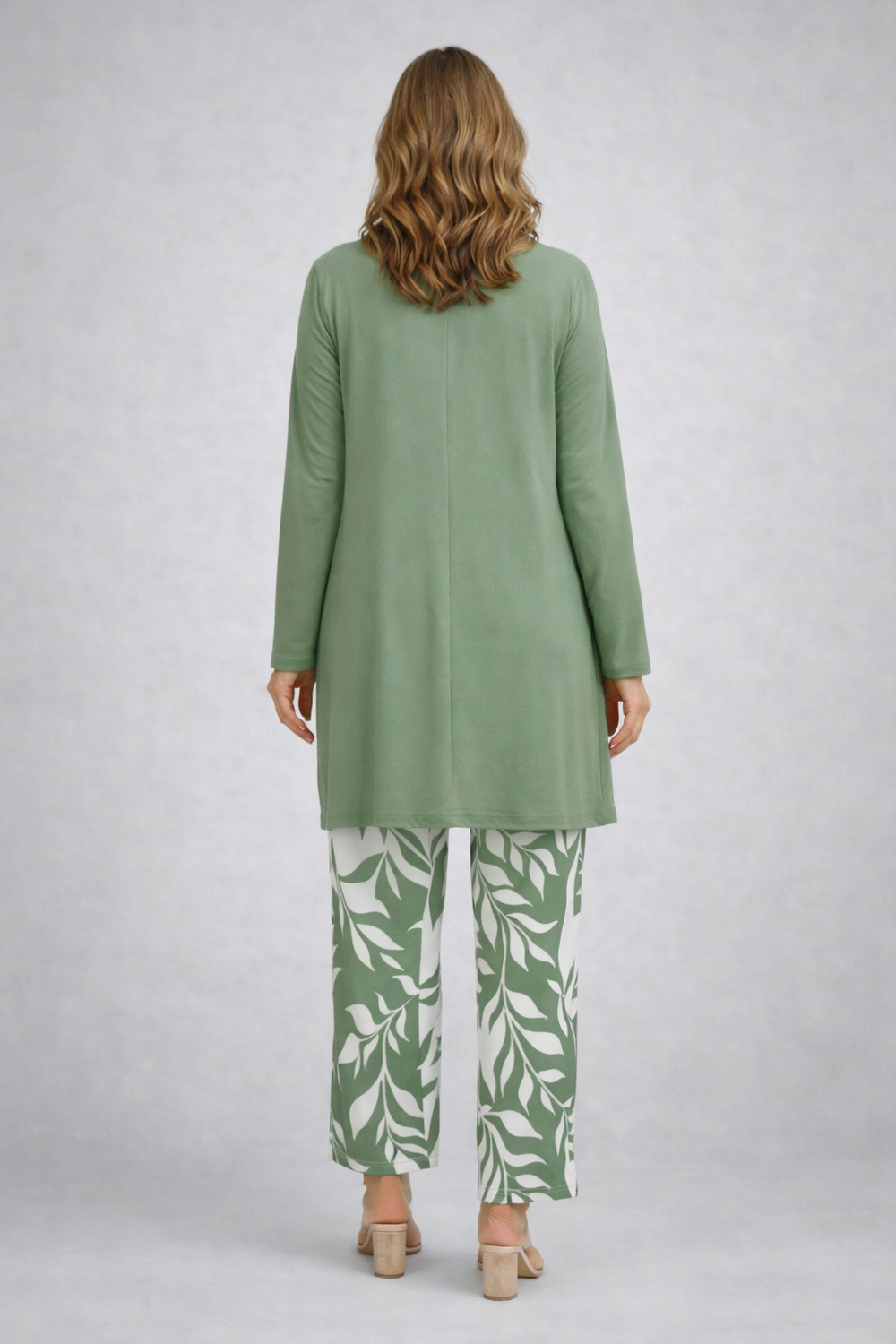 Back view of the sage and white open-front cardigan and leaf print pant set