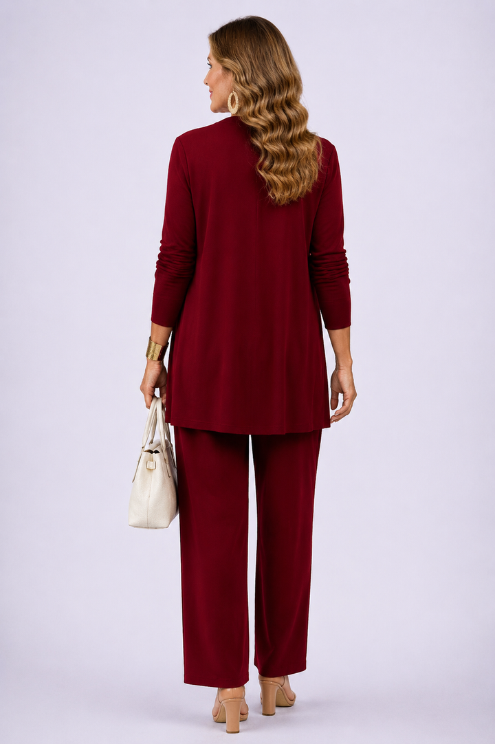 Back view of the burgundy and white open-front cardigan and floral top pant set