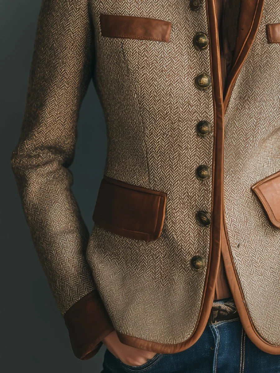 Detail of contrast trim on herringbone jacket pocket