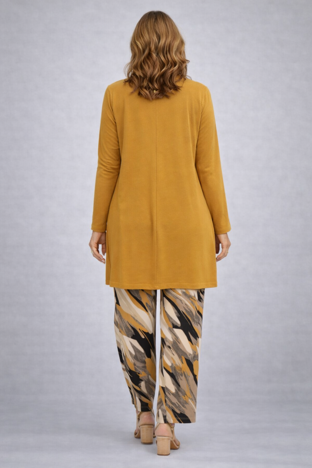 Another view of the mustard open-front cardigan and abstract print pant set