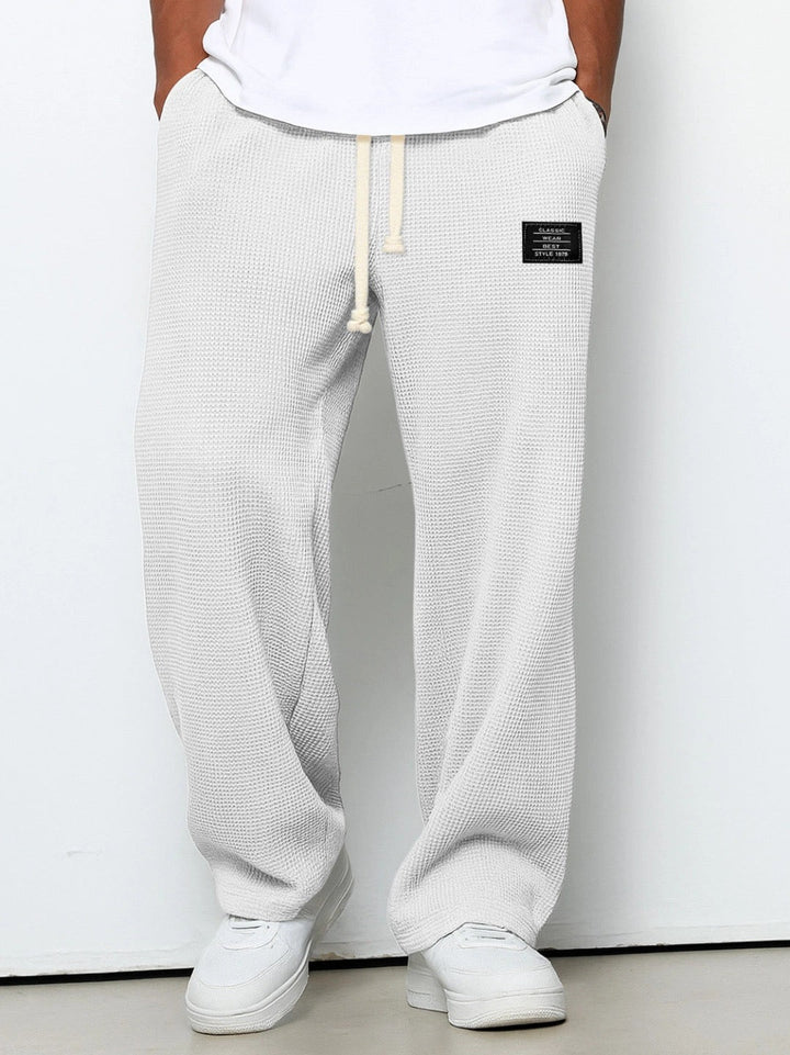 Men's off-white relaxed wide-leg drawstring pants