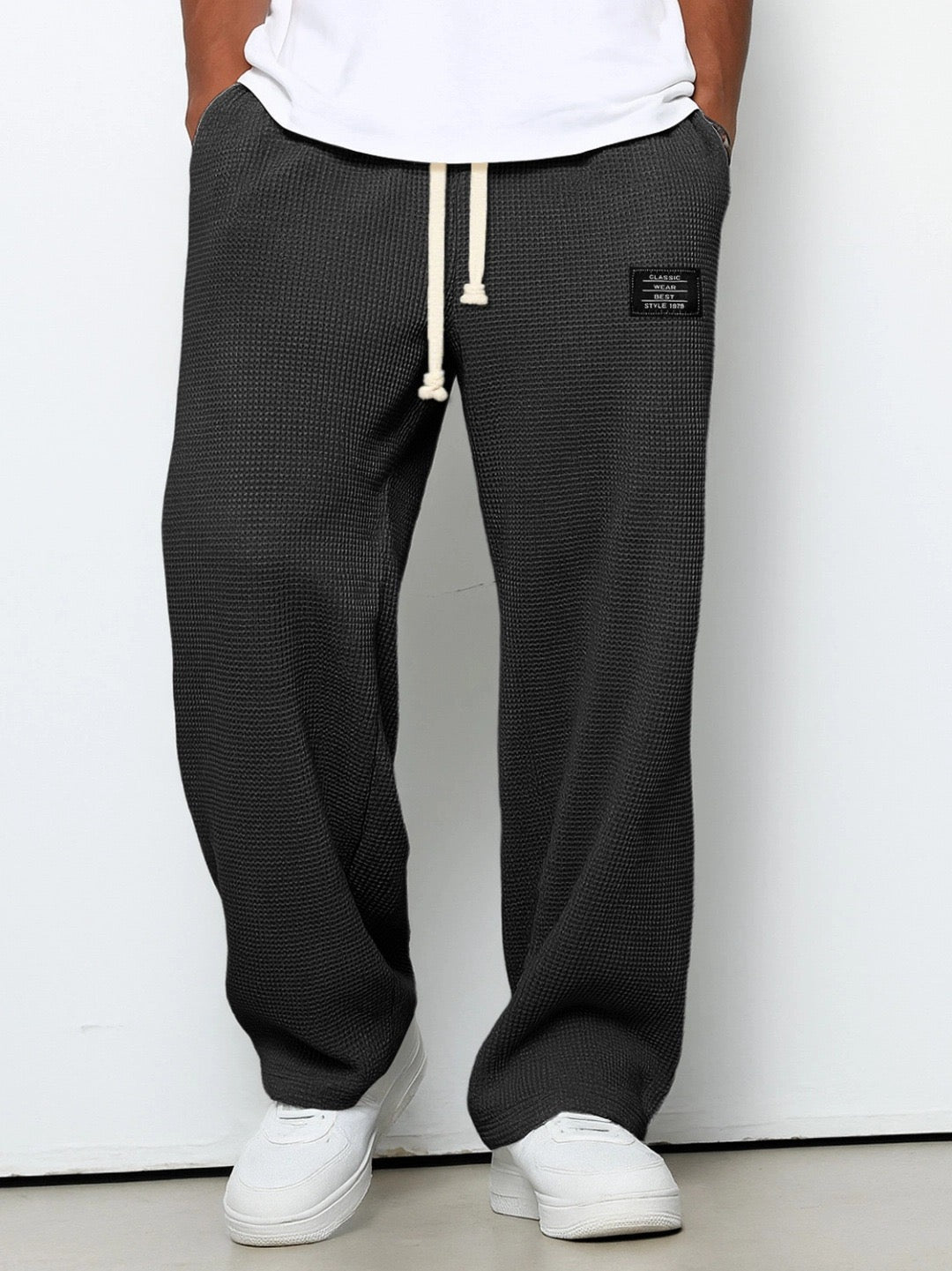 Men's black relaxed wide-leg drawstring pants