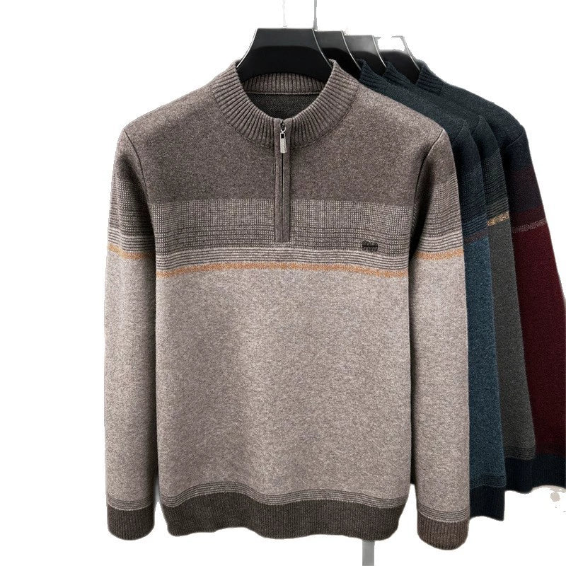 Half-zip sweaters on hangers in all four colors